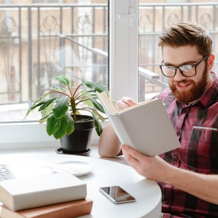 Manager reading book for development